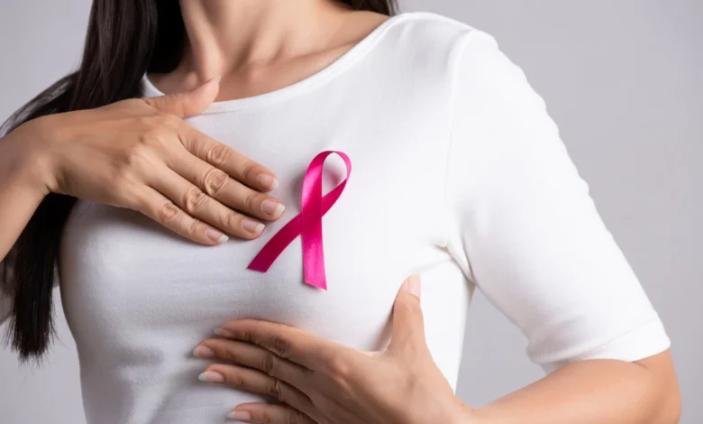 1920 stockphotoofapersonwearingabreastcancerribbon 6868ec85b4bad