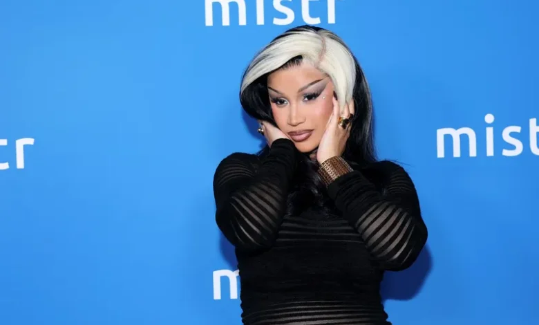 image may contain cardi b adult person hair photography face head and portrait